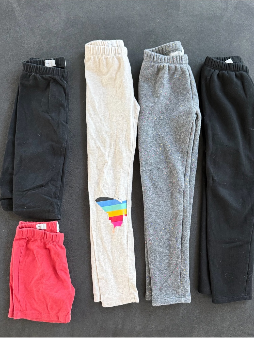 Gap Kids Leggings. 5 pairs. The gray and black leggings are fleece lined.